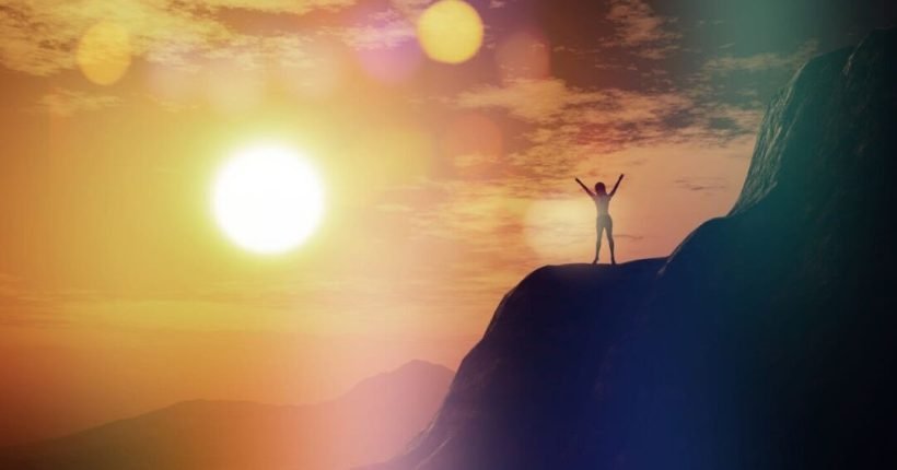 3d-render-female-with-arms-raised-cliff-against-sunset-sky_1048-6028