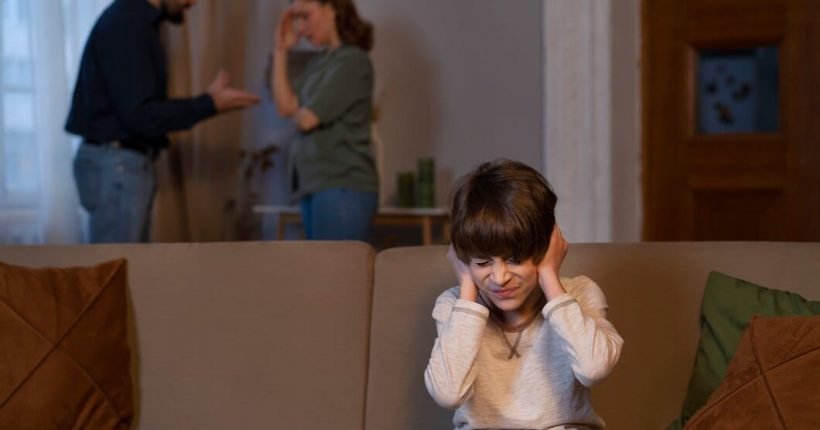 young-child-suffering-from-abuse-by-parents-fighting-home_23-2150248218